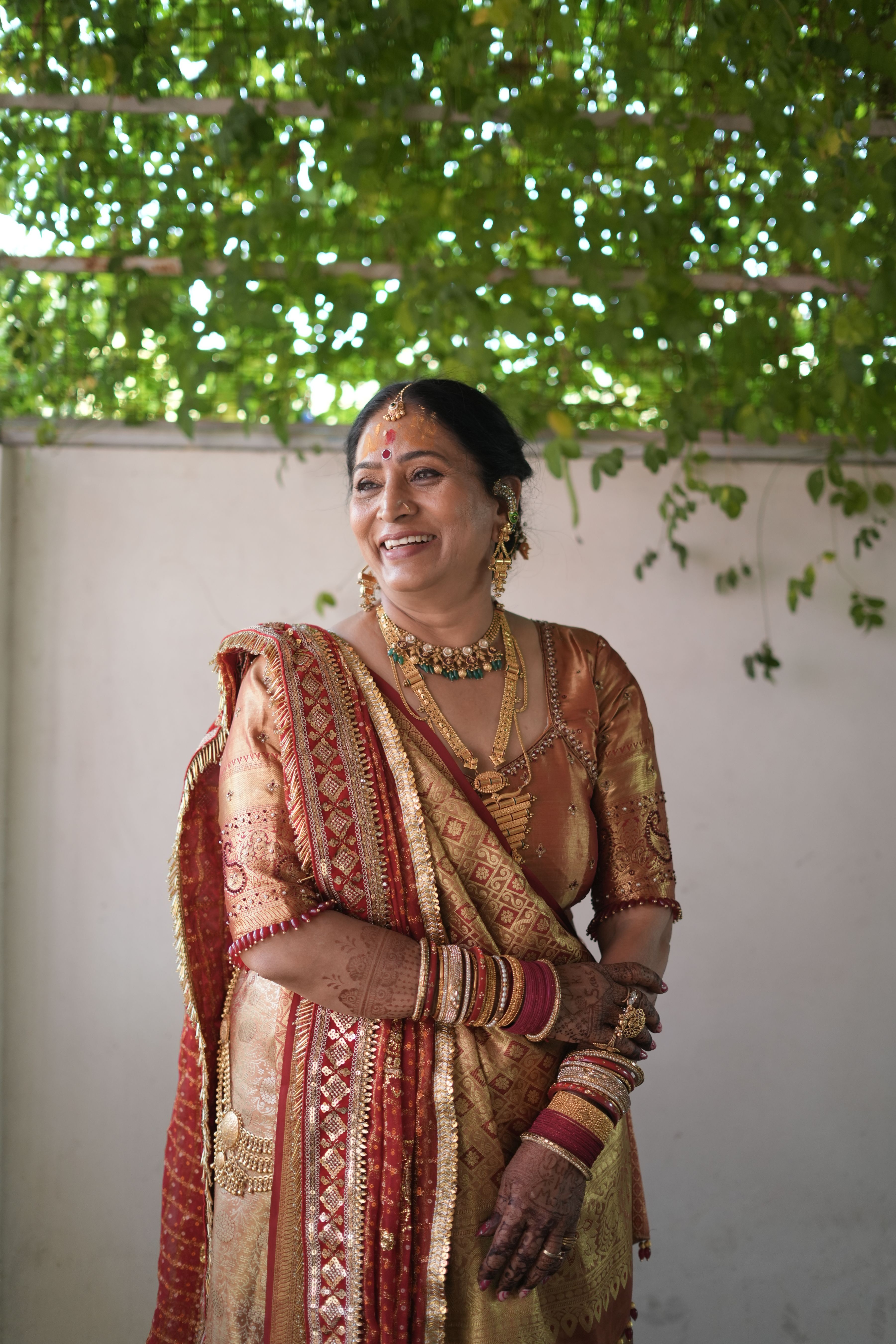 Mayuri Patel (Grooms mom) - Outfits are from Ganga Pooja.