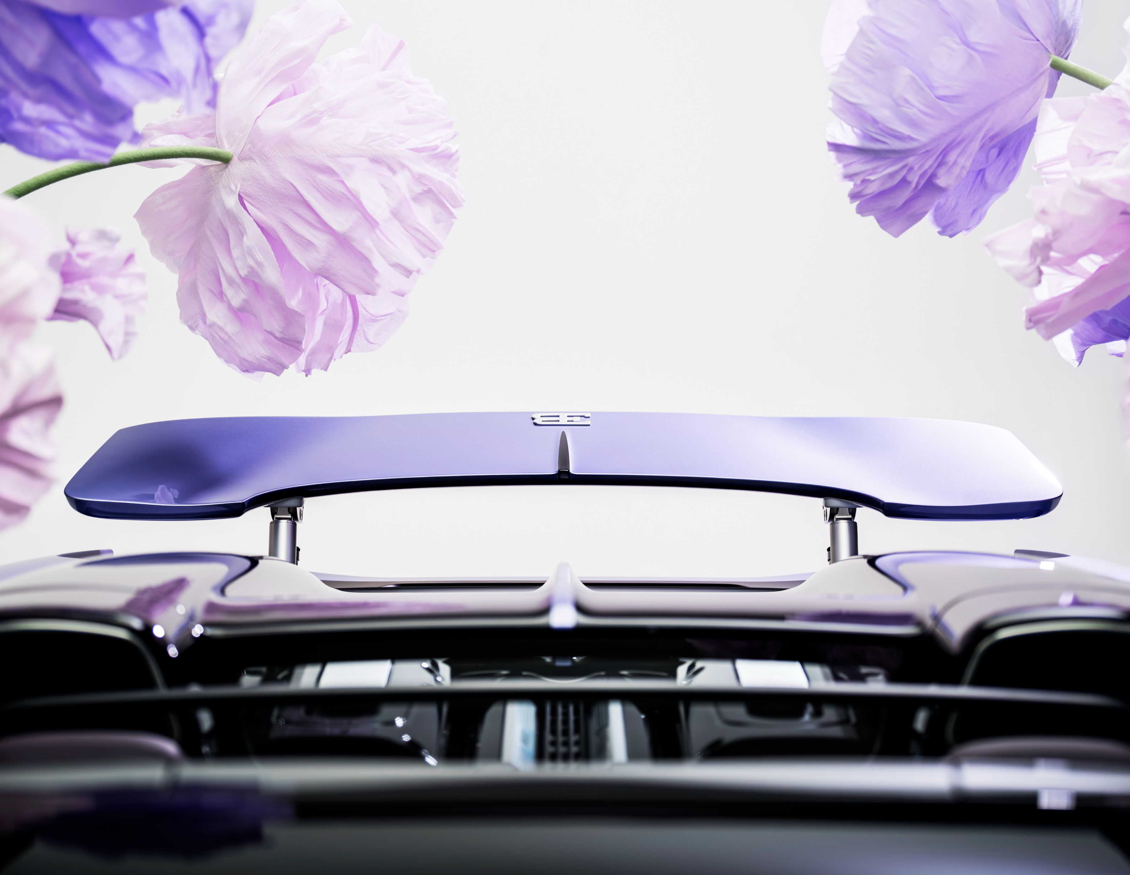The exterior of the Bugatti W16 Mistral 'Caroline' reveals itself subtly, in nuance and movement. Its defining color, bespoke 'Lavender' paintwork.