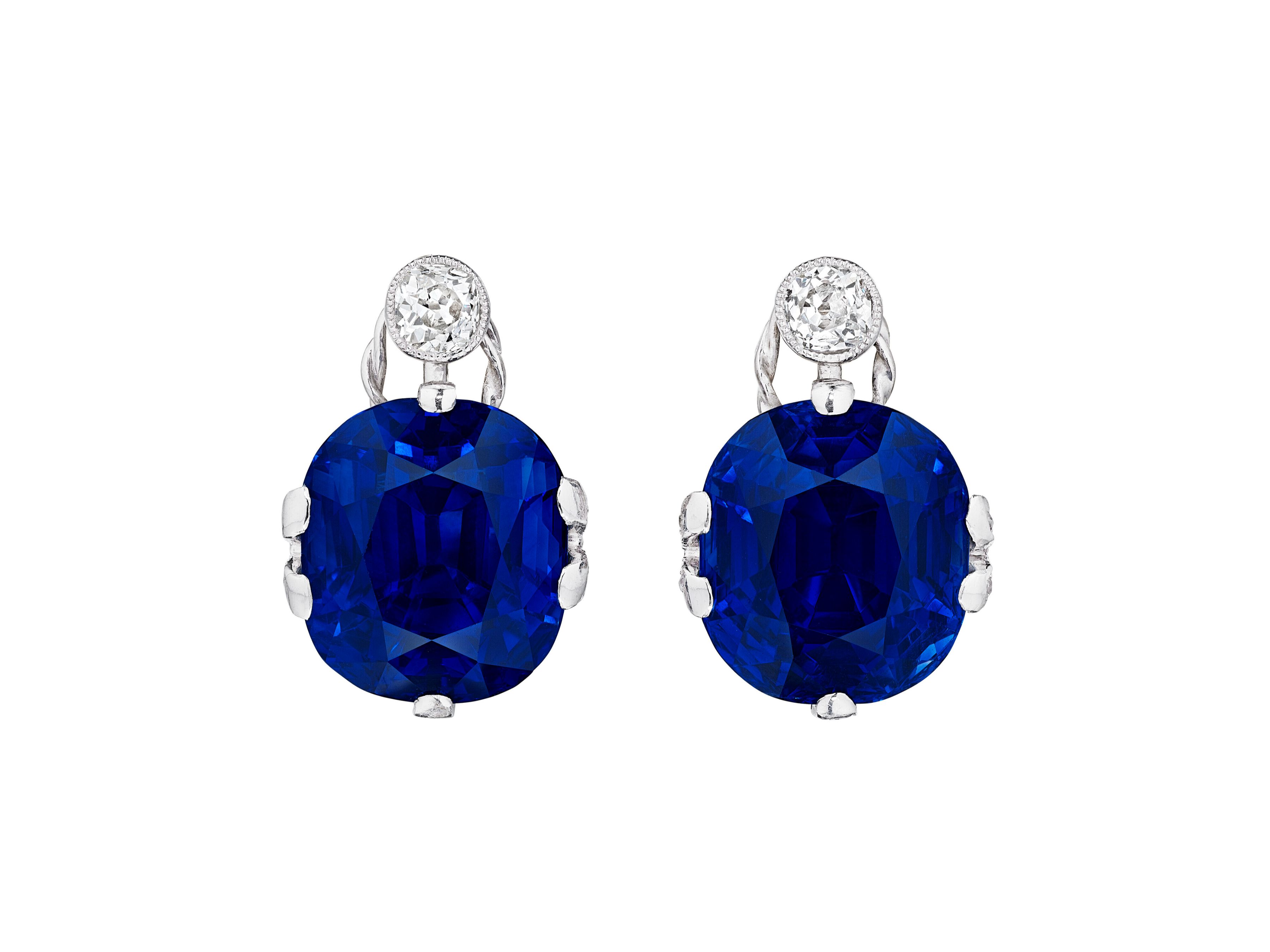 A Pair of Exceptional Antique Sapphire and Diamond Earrings, Cushion mixed-cut sapphires of 12.61 and 11.92 carats, Price Realized: $3,064,000