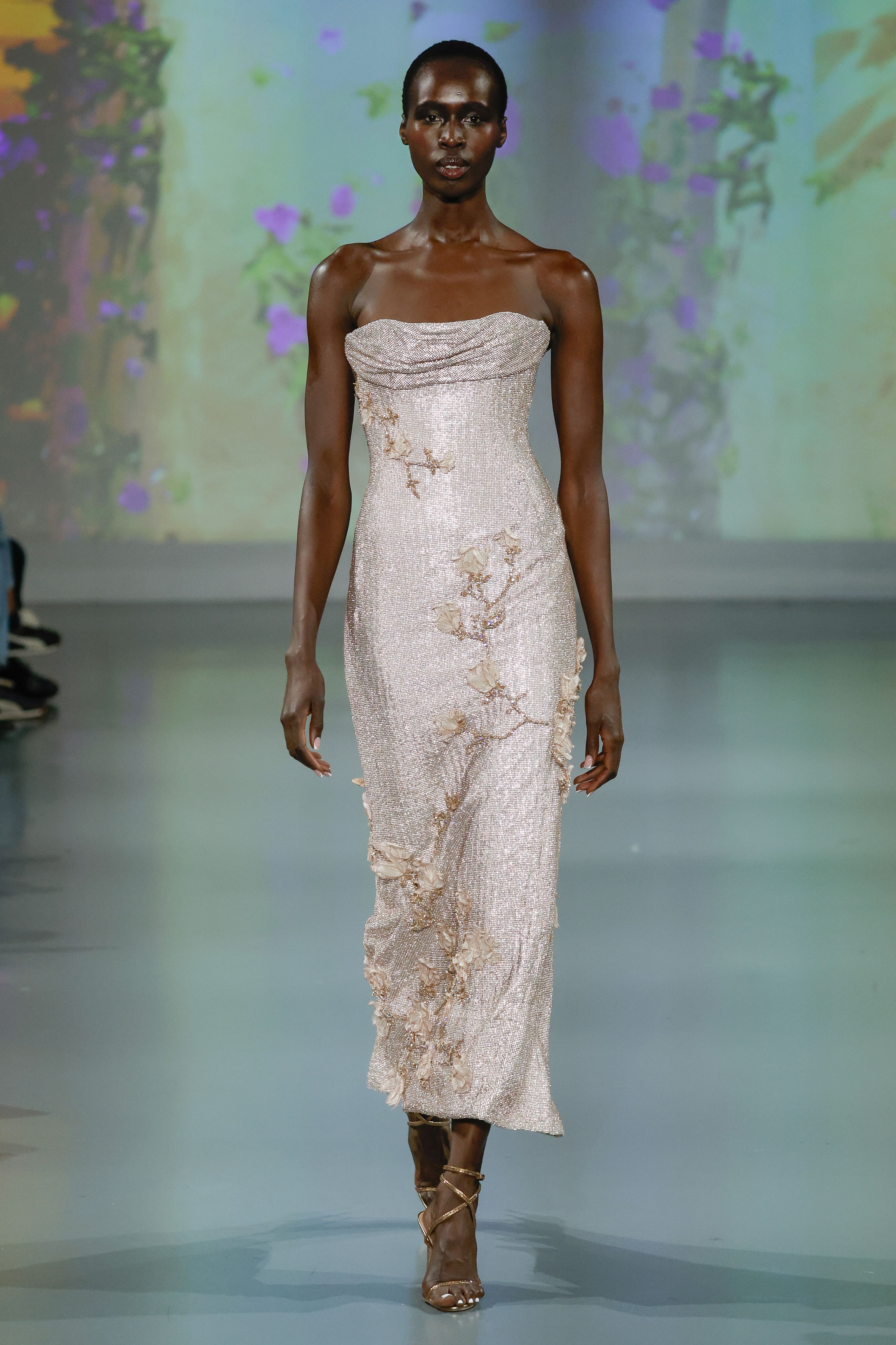 Ines Di Santo Couture Spring/Summer 2025—Aphrodite - Strapless draped opulent sheath with crystal and hand-painted blossoms.