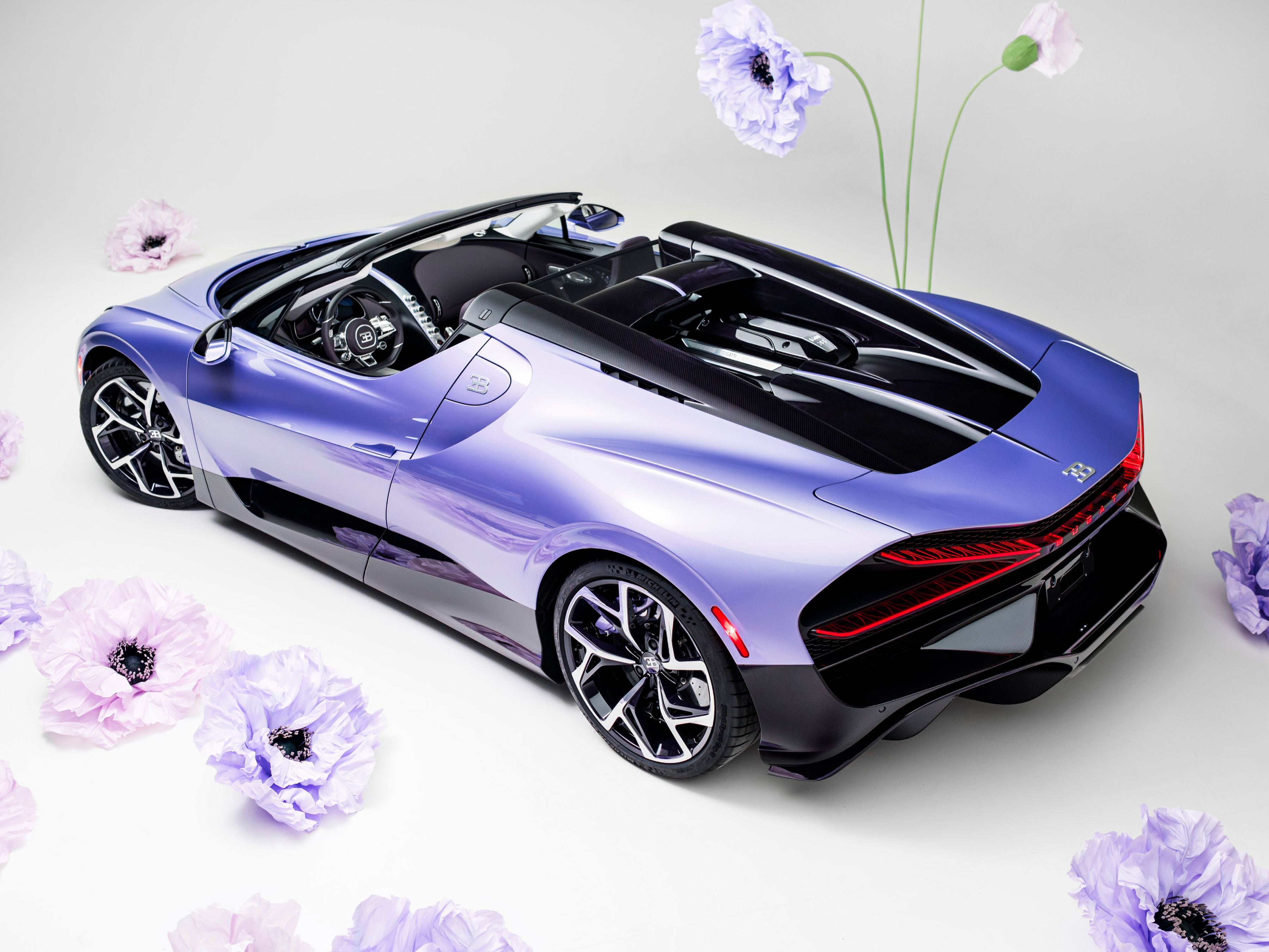 The exterior of the W16 Mistral 'Caroline' subtly reveals itself through nuance and movement. Its defining color, bespoke 'Lavender' paint.