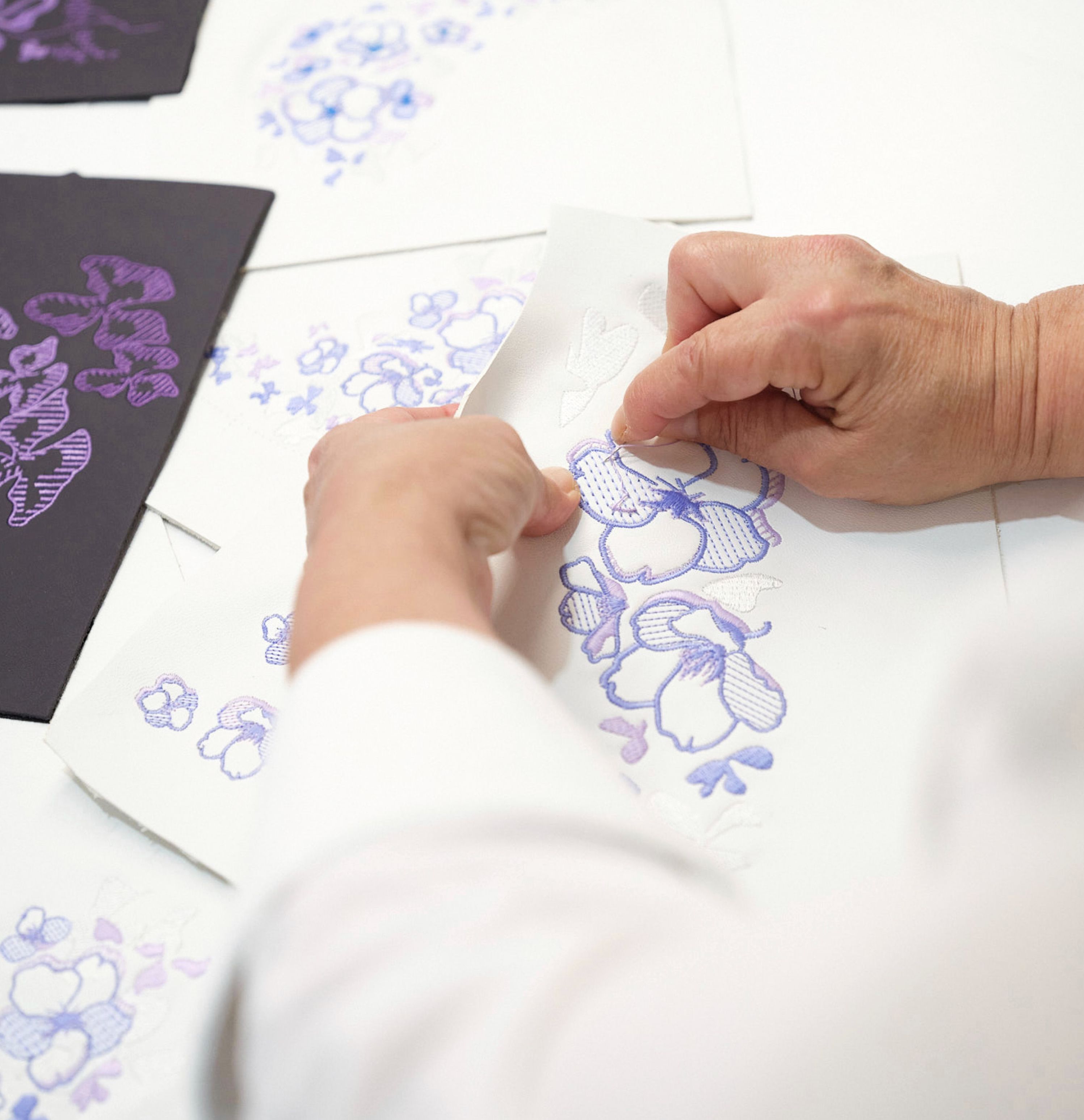 The Bugatti W16 Mistra floral theme is brought to life through intricate embroidery chosen for its ability to convey depth and delicacy.