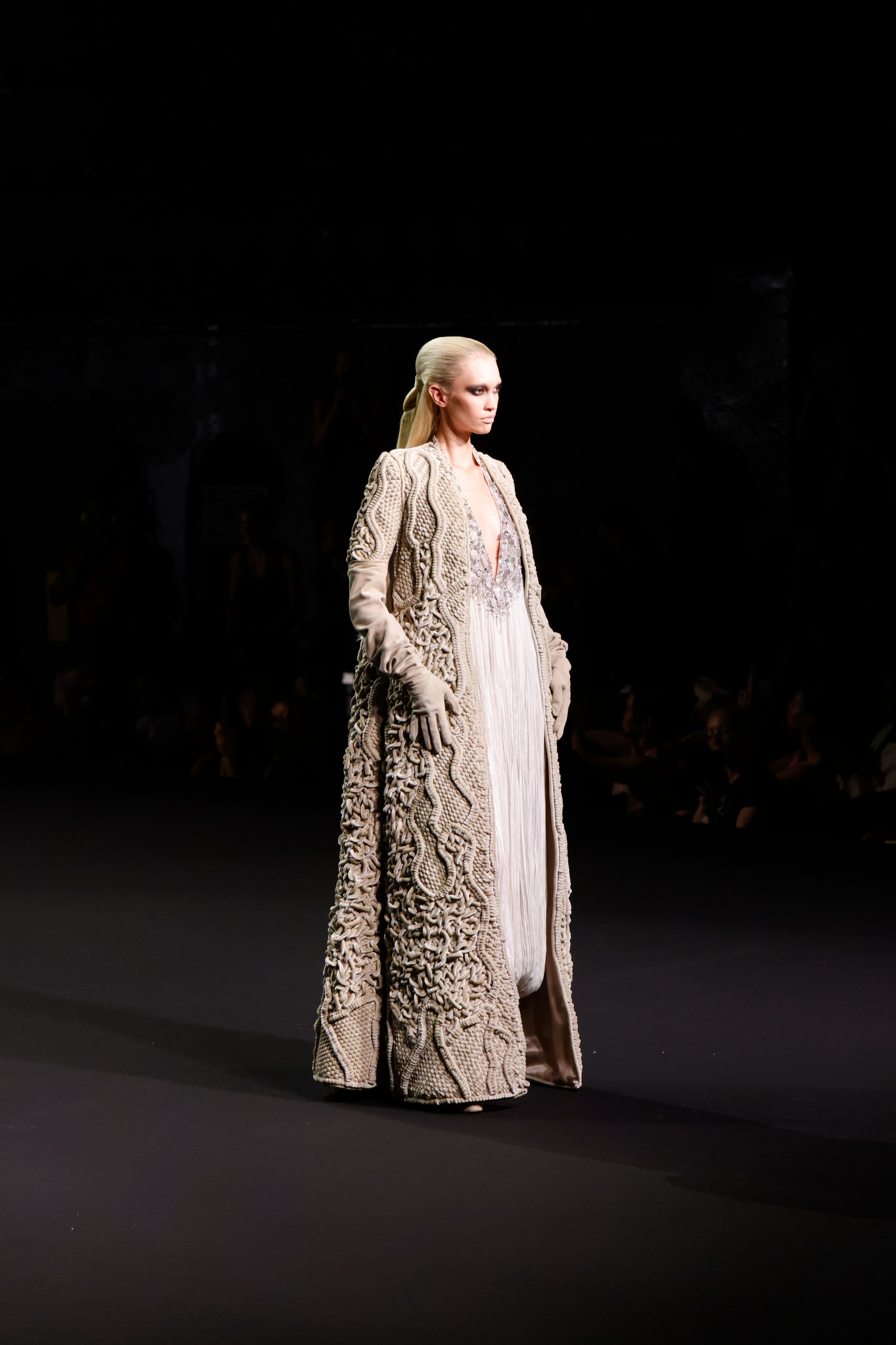 Stéphane Rolland, Haute Couture 2026/2027 Fall/Winter Collection - Zouave trouser jumpsuit in white pleated chiffon embroidered with grey agate and crystal. Coat in greige velvet macramé.