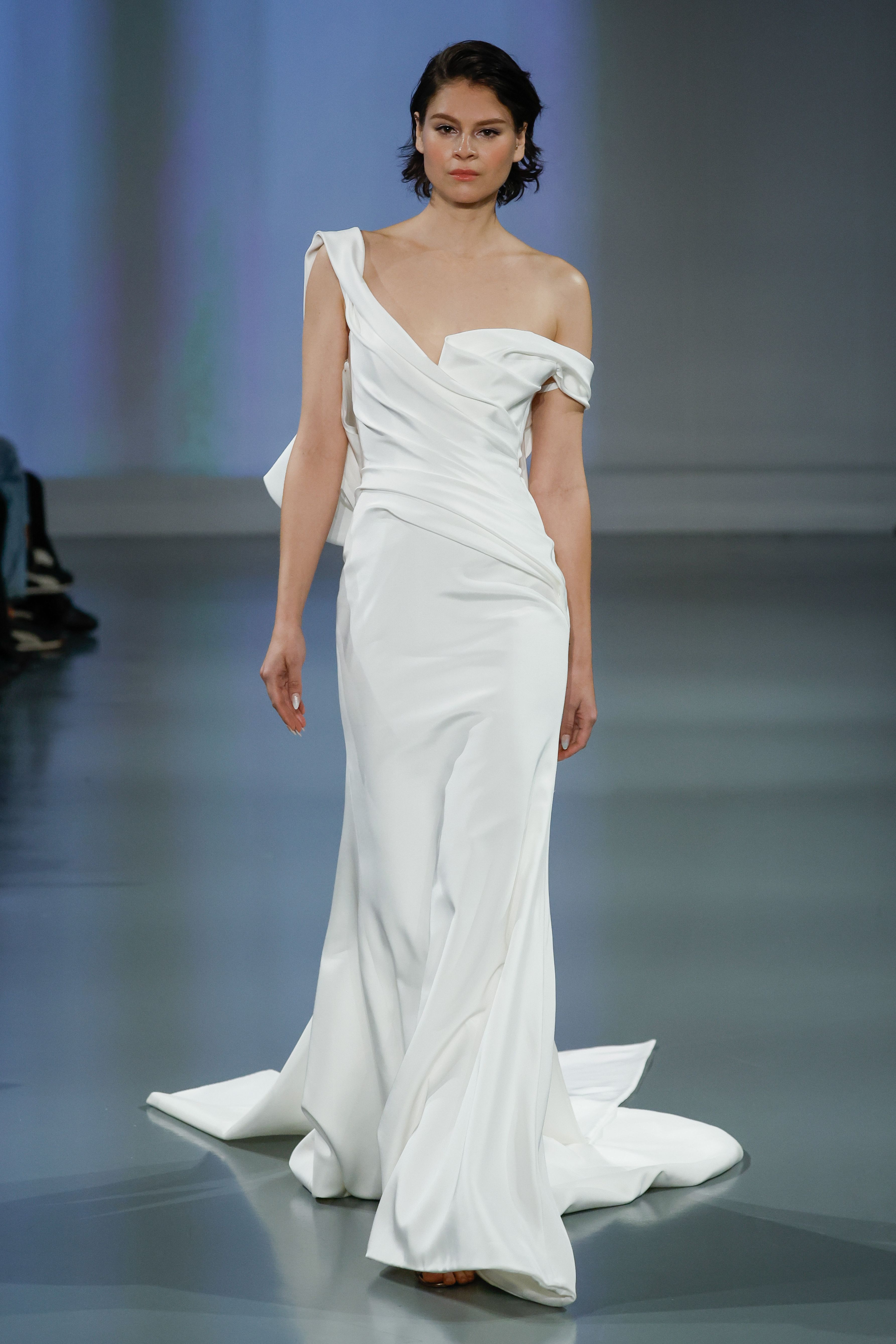 Ines Di Santo Couture Spring/Summer 2025—Henrietta - Asymmetrical draped gown with Illusion. Signature low illusion back and large bow streamers.