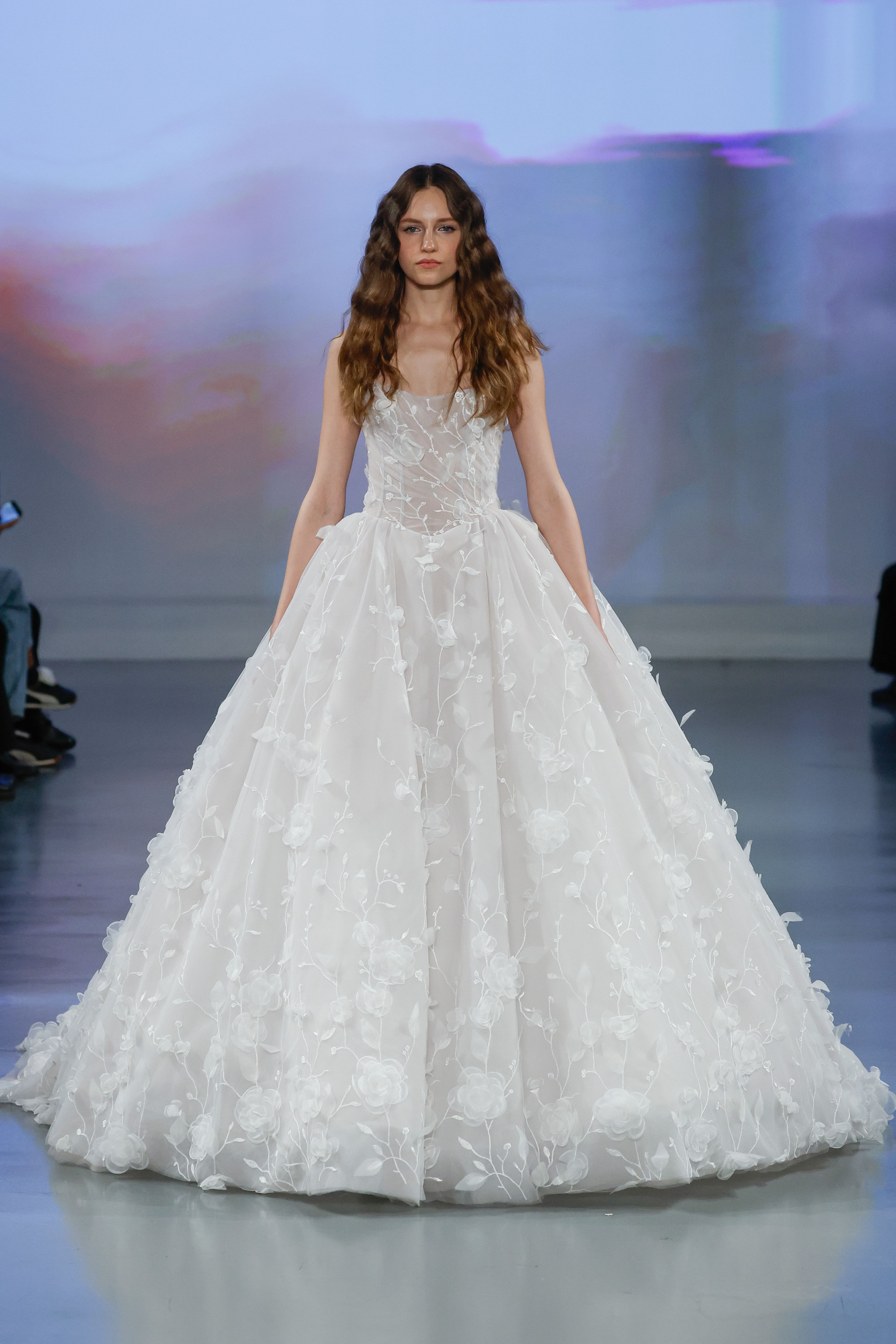 Ines Di Santo Couture Spring/Summer 2025—Jane - A voluminous ballgown skirt adorned with handmade organza florals is suspended from a square neck draped bodice.