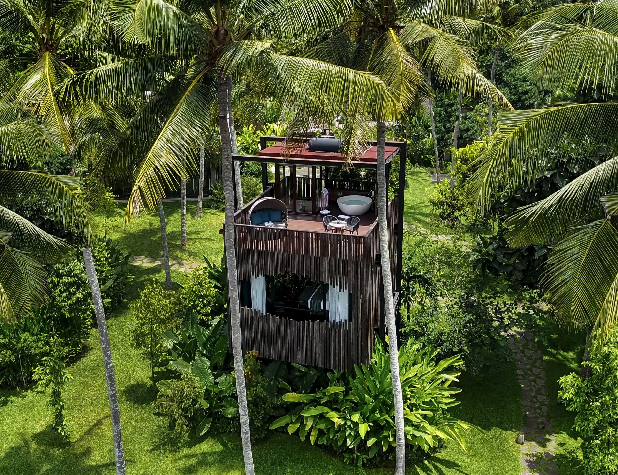 Nirjhara, designed among coconut trees, is our one-bedroom Canopy Suite