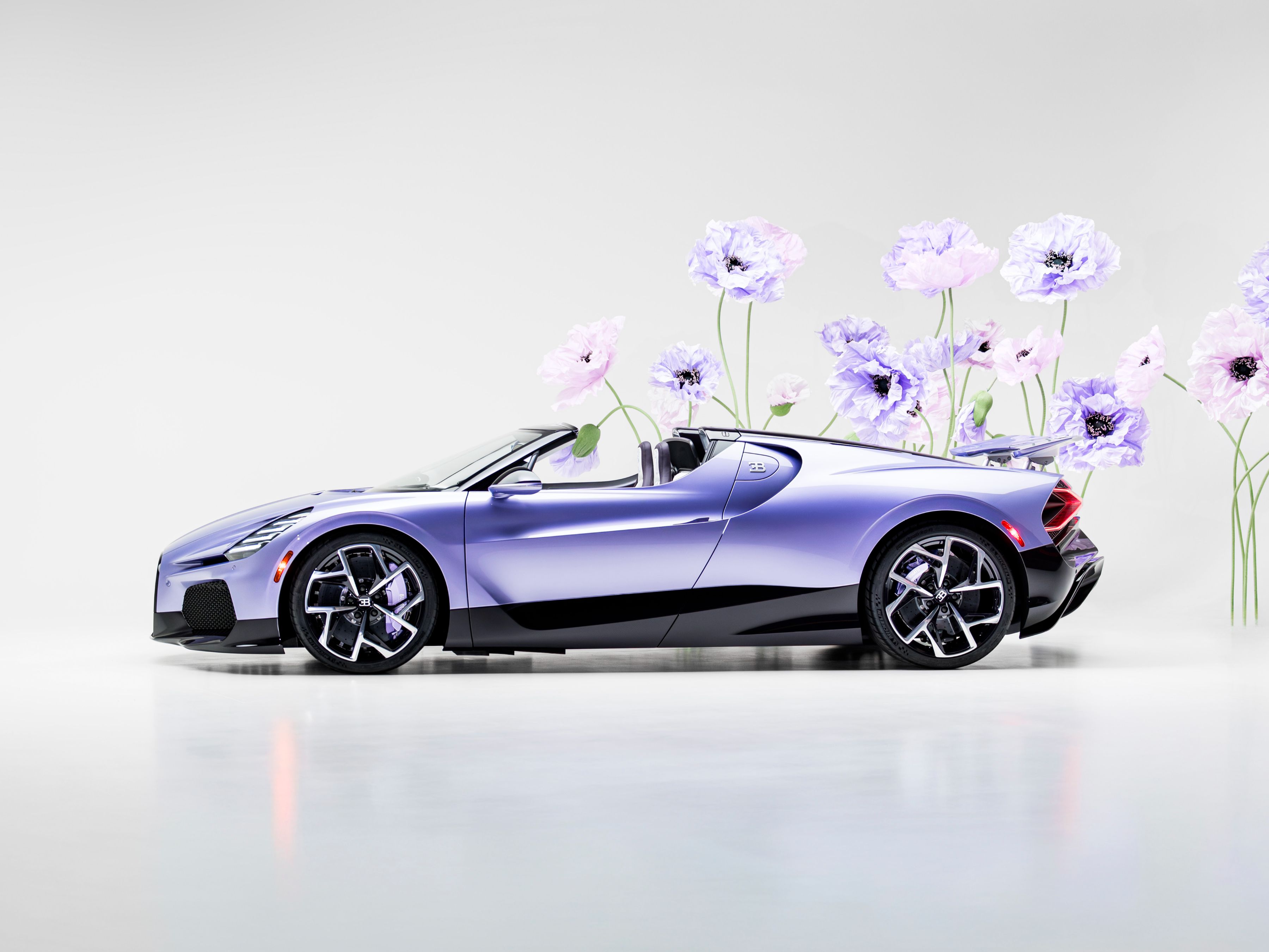 The Bugatti W16 Mistral beauty of flowers, intertwined with Haute Couture and a heartfelt tribute in the car's name—chosen to honor his daughter.