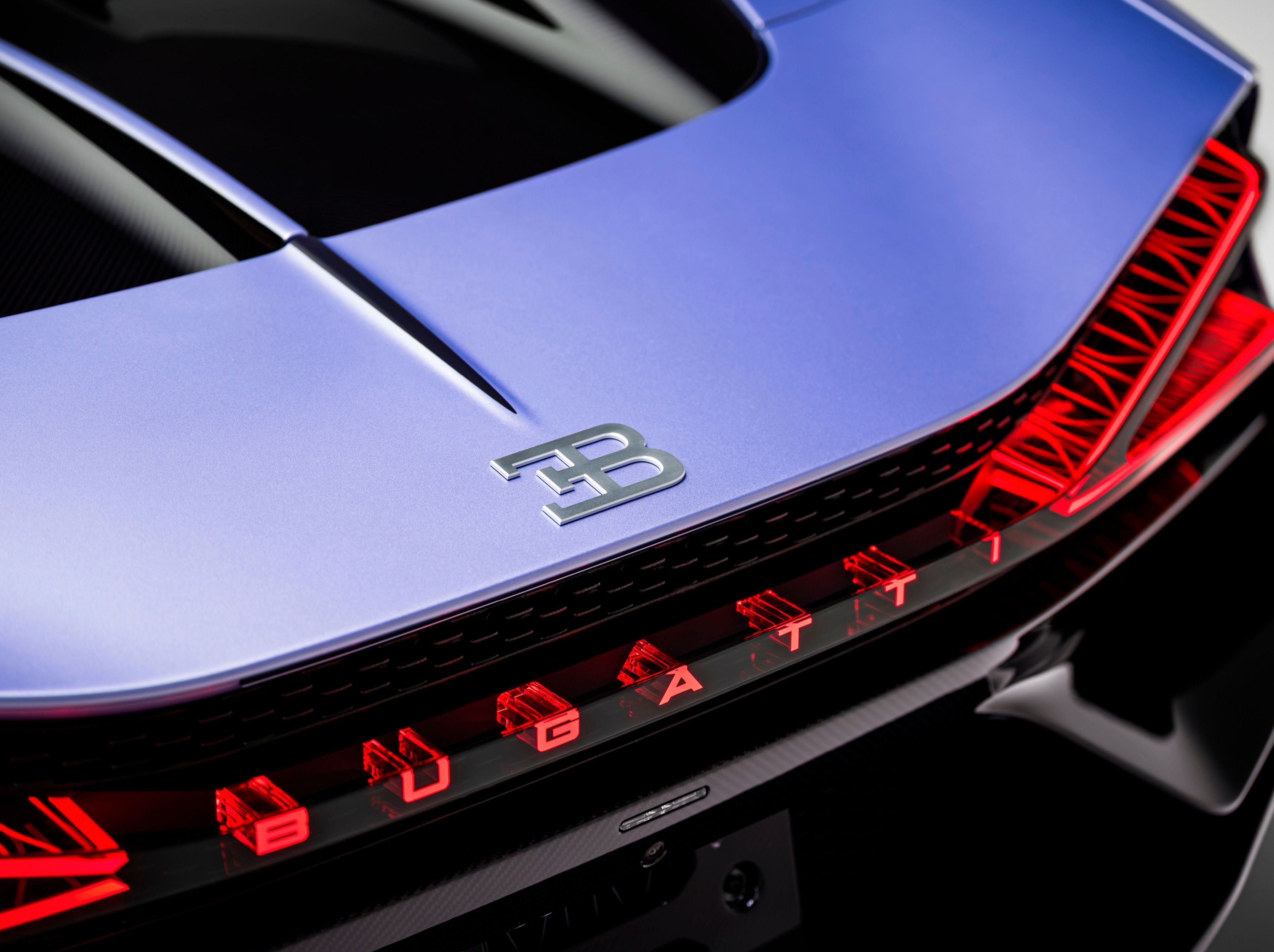 The exterior of the Bugatti W16 Mistral 'Caroline' reveals itself subtly, in nuance and movement. Its defining color, bespoke 'Lavender' paintwork.
