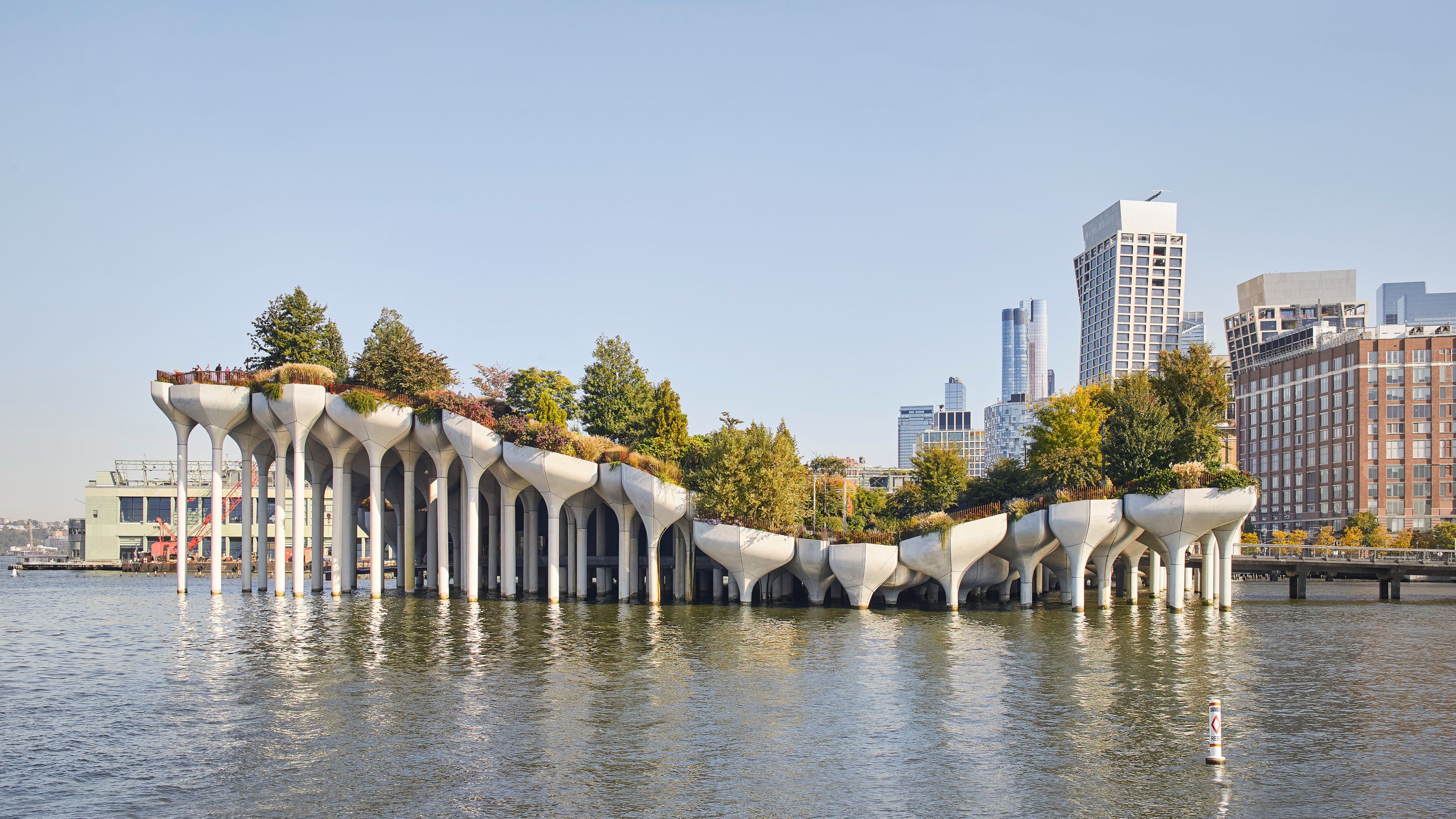 Little Island design is supported by 132 precast concrete "pots," each mounted on a large precast concrete column