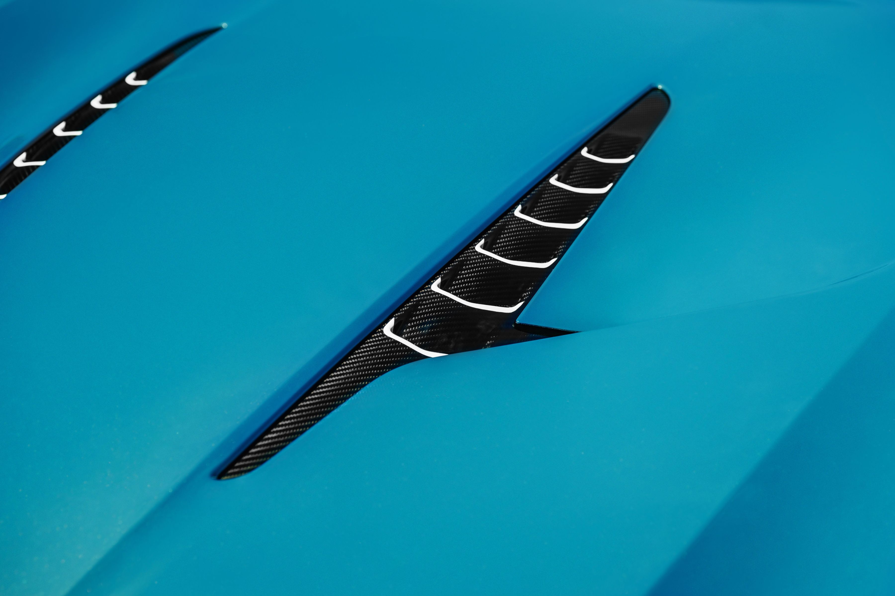 Aston Martin Wave Edition Vanquish Volante design features evoke water's rhythm, reflection, and tranquility in motion.