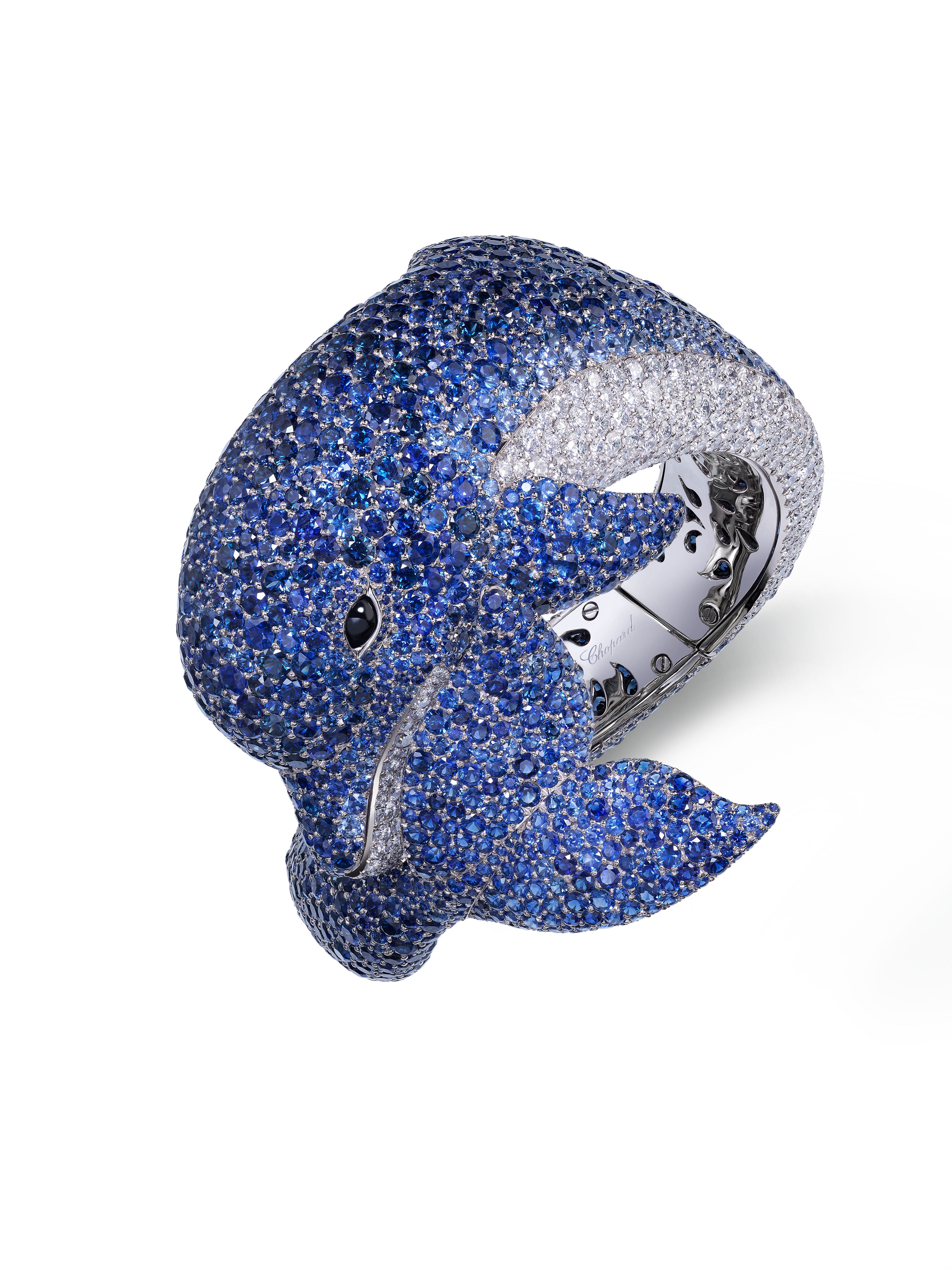 Chopard's Red Carpet Collection 2025, 'Caroline's Universe' - Dolphin bracelet in ethical 18-carat white gold set with brilliant-cut sapphires (91.95 cts), brilliant-cut diamonds (8.84 cts). Eyes set with onyx cabochons.
