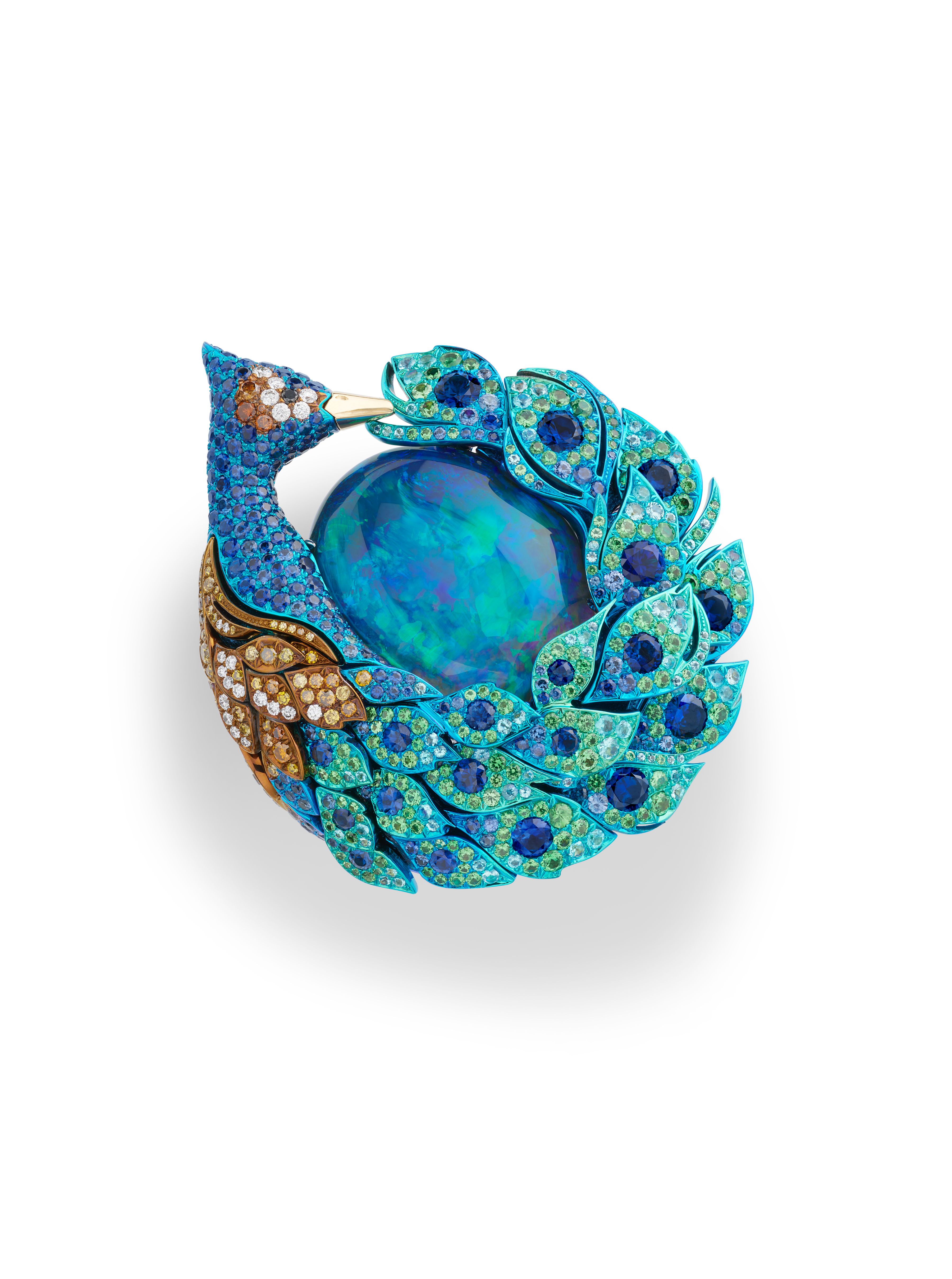 Chopard's Red Carpet Collection 2025, 'Caroline's Universe' - Peacock ring in titanium and ethical 18-carat yellow and white gold, featuring a 15.71-carat black opal cabochon, set with brilliant-cut sapphires (2.70 cts), tsavorites (0.86 ct), white (0.63 ct) and black (0.35 ct) diamonds as well as Paraiba tourmalines (0.28 ct).